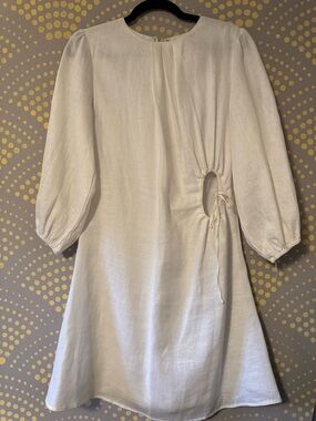 Dissh white linen-blend mini dress with side cutout detail.